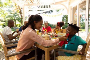 Family eating together at table