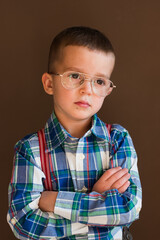 Portrait of smart stylish little boy