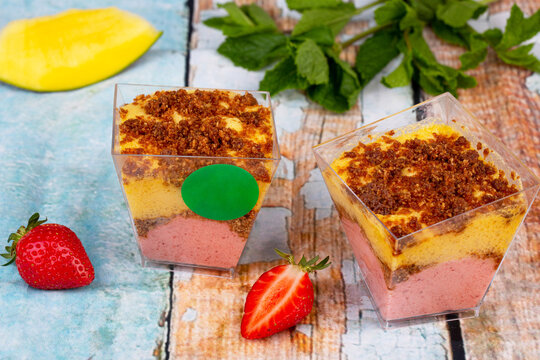 Fruit mousse with the addition of strawberries and mangoes, layered with cramble of rice and almond flour, coconut sugar and coconut oil