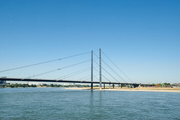 Dusseldorf, Germany – July 24, 2019: The Rheinkniebrücke is a cable-stayed bridge over the Rhine in Düsseldorf, opened to traffic on 16 October 1969.