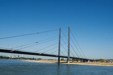 Dusseldorf, Germany – July 24, 2019: The Rheinkniebrücke is a cable-stayed bridge over the Rhine in Düsseldorf, opened to traffic on 16 October 1969.