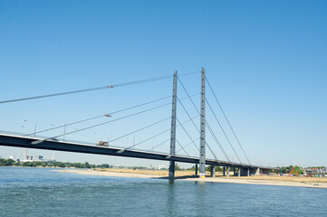 Dusseldorf, Germany – July 24, 2019: The Rheinkniebrücke is a cable-stayed bridge over the Rhine in Düsseldorf, opened to traffic on 16 October 1969.