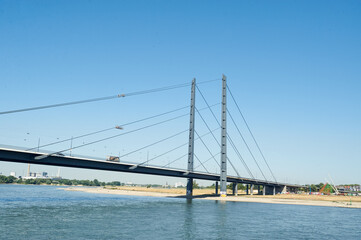 Dusseldorf, Germany – July 24, 2019: The Rheinkniebrücke is a cable-stayed bridge over the Rhine...