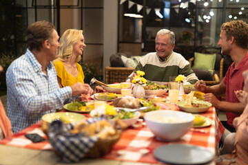 Fototapeta na wymiar Multi-generation Caucasian family during a dinner 