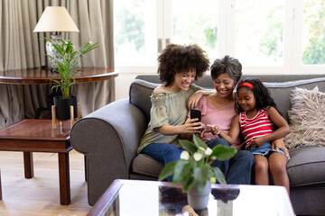 Multi-generation mixed-race family enjoying their time at home