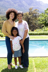 Fototapeta premium Multi-generation mixed race family enjoying their time at a garden