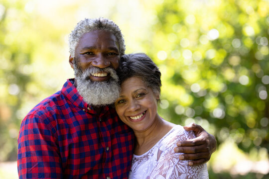 Portrait of a senior mixed race couple enjoying their time at the garden - Powered by Adobe