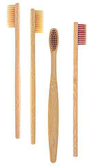 Bamboo toothbrushes on white background, dental concept. Eco-friendly bamboo toothbrushes.