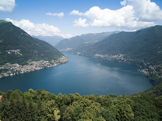 Obraz premium aerial view of como lake in a sunny day with clouds and clear blue sky - Lombardy.