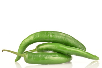 Green chili pepper, close-up, on a white background.