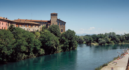 Fototapeta na wymiar castle of Cassano D'Adda, Italy, at the foot of the river.