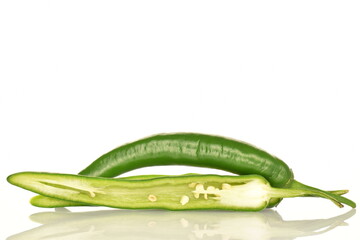 Green chili pepper, close-up, on a white background.