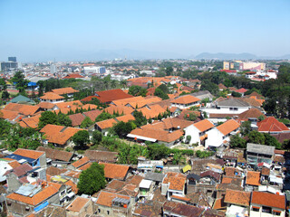 Naklejka na ściany i meble Looking down at Bandung city in West Java, Indonesia.