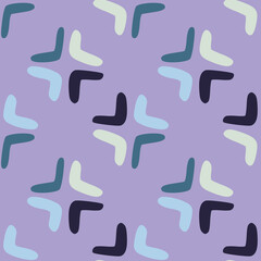 Seamless pattern with boomerang on purple background. Abstract shape endless wallpaper