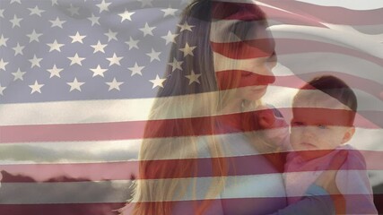 Caucasian mother and son with US flag waving foreground - Powered by Adobe