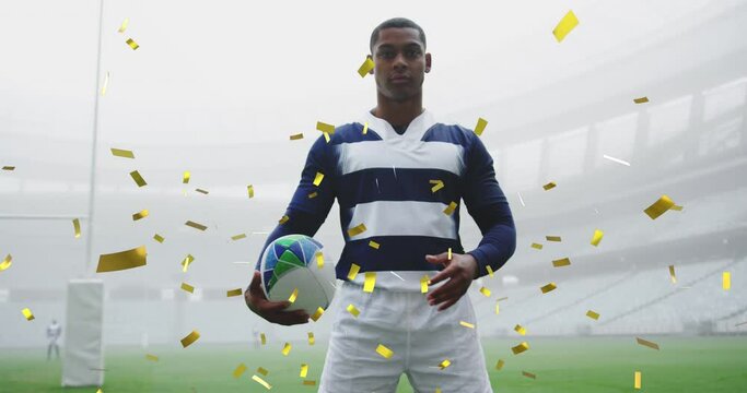 Animation of gold confetti falling over mixed race male rugby player looking at the camera