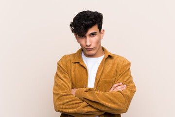 Obraz premium Young Argentinian man over isolated background feeling upset