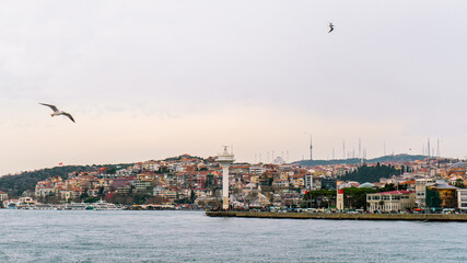 Fototapeta na wymiar Istanbul - Turkey - 01/24/2019 : Most tourists must have taken a walk in the Uskudar seaside with the beautiful view of the bridge and Maiden's Tower