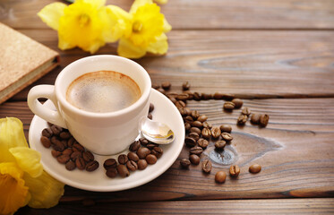 Cup of coffee on wooden table