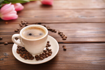 Fototapeta premium Cup of coffee on wooden table