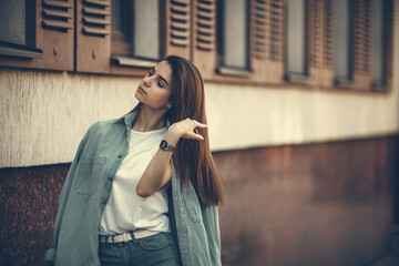 Obraz premium Hipster girl casual wear. Summer city portrait