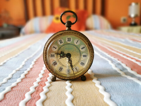 Classic clock in a rural house. Old number. Chronometer