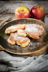 Homemade pancakes on a wooden table.