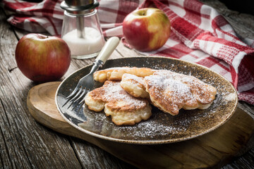 Homemade pancakes on a wooden table.