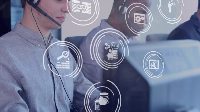 Animation of white icons flying over men working in an office