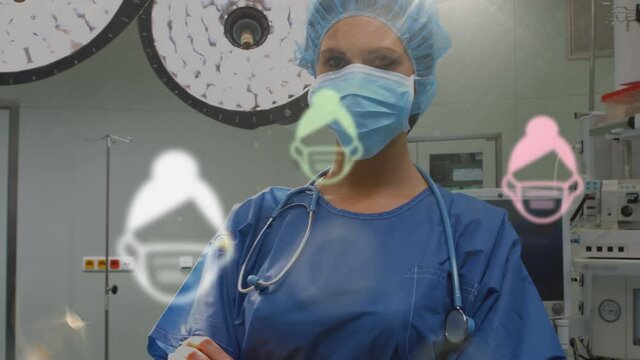 Animation of a surgeon cwith crossed ars in a room with macro icons