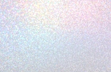 Iridescent shimmer blurred texture. Light pink blue yellow ombre background.