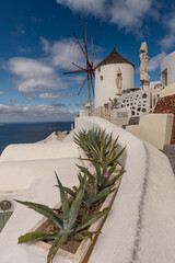 windmill in oia santorini greece