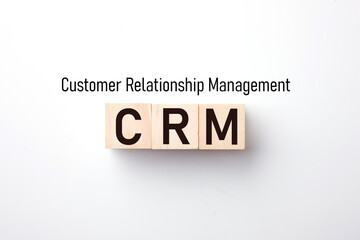 Customer Relationship Management : Business text on wood block on White background. gross domestic product