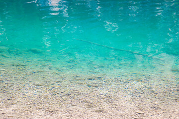 Beautiful clear cold clear water in a lake or river in the mountains.