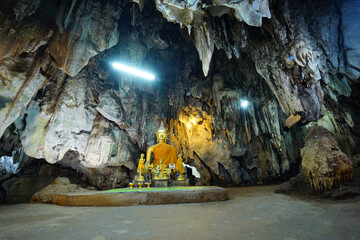 Natural rock cave Light up the path and hallway Wat Tham Khao Pun Kanchanaburi province of Thailand