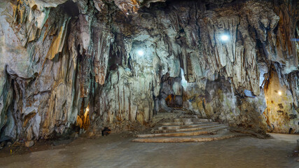 Natural rock cave Light up the path and hallway Wat Tham Khao Pun Kanchanaburi province of Thailand