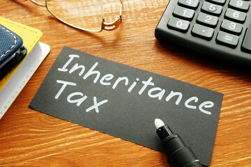 Inheritance tax is shown on the conceptual business photo