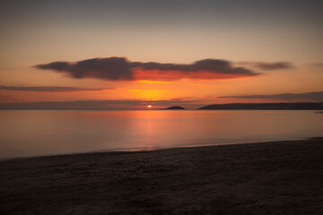 Sunset over Looe Island Whitsand Bay Cornwall