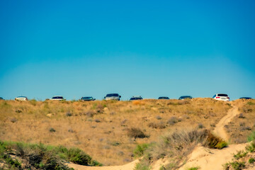 Parking on a hill on the sea coast. Cars in the parking lot