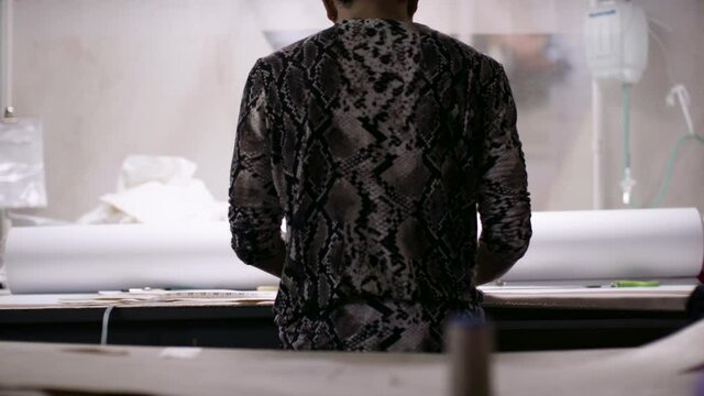 Fashion designer in creative studio. shot in 4k. 