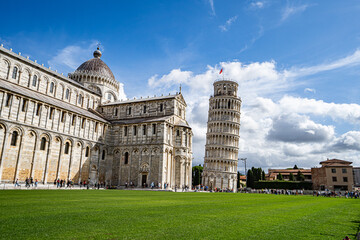 Duomo Leaning tower of Pisa with dramatic blue cloudy sky