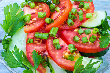 Salad of tomatoes and cucumbers close up. Top view