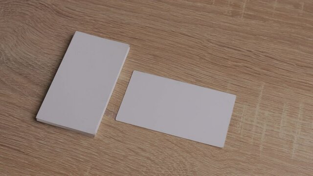 blank white paper business cards on table