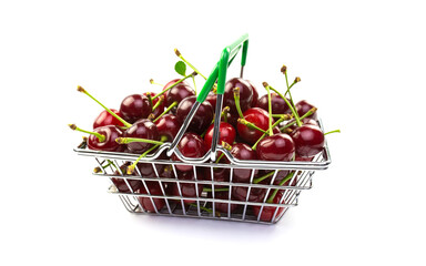 In a metal basket on a white background there are berries