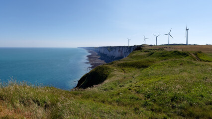 Wind turbines on the white cliff of the Normandy coast