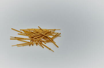 Potentiometers stand on the gray background. Many Potentiometers. Macro close up of electronic...