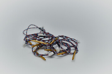Potentiometers stand on the gray background. Many Potentiometers. Macro close up of electronic...