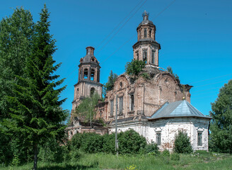 An old temple overgrown with greenery.