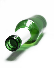 Closeup of opened green bottle. Beer bootle isolated on white background