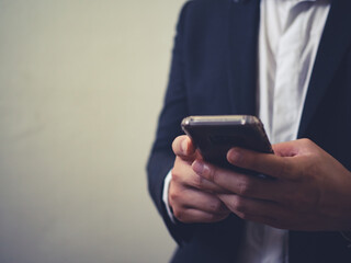 close up of business man using smartphone, concept of technology for business, network online.